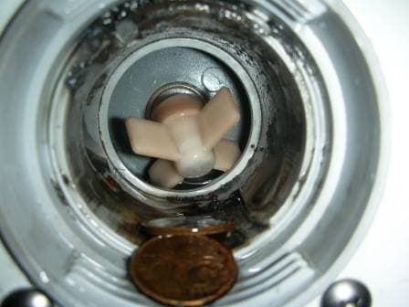 Coins broke the impeller of the washing machine pump